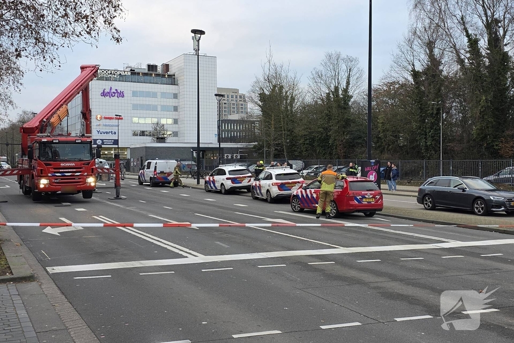 Politie houdt winkeldief aan op dak