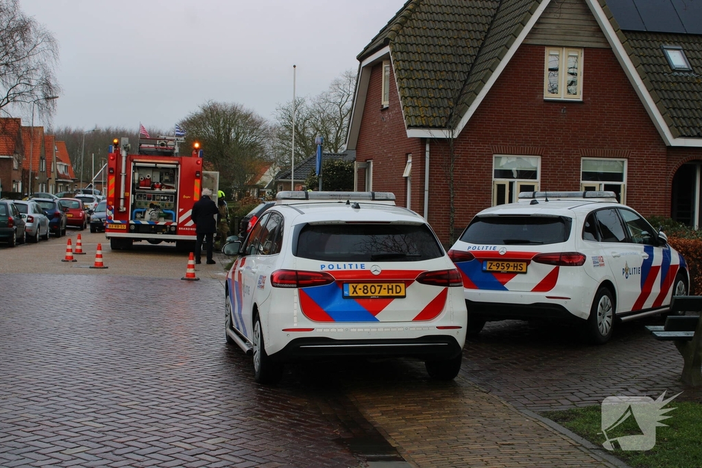 Politie onderneemt bluspoging bij woningbrand