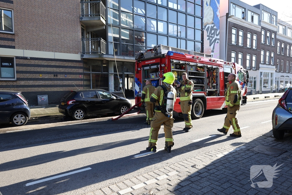 Politie pakt bewoner na woningbrand