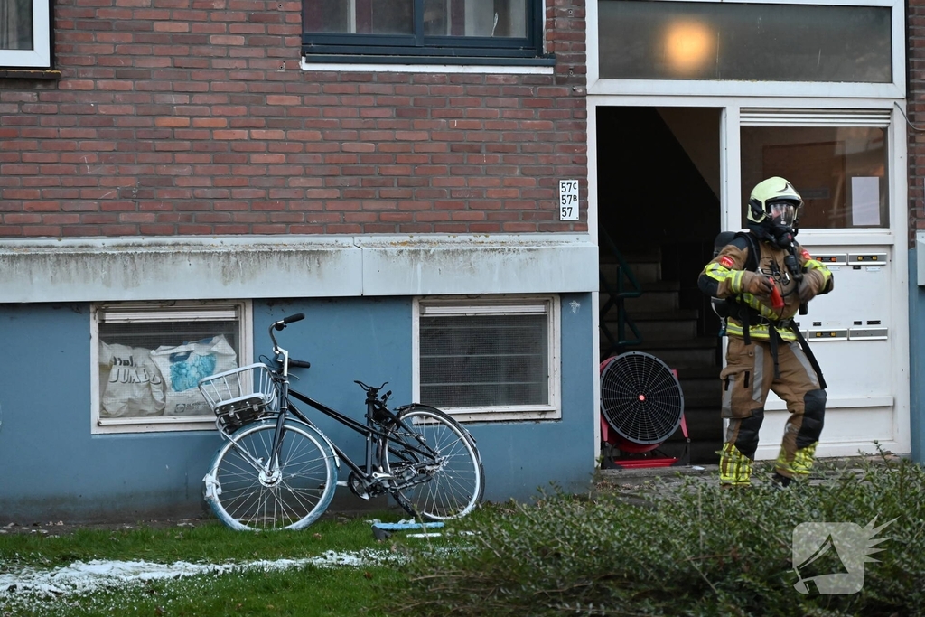 Fiets in portiek veroorzaakt brand
