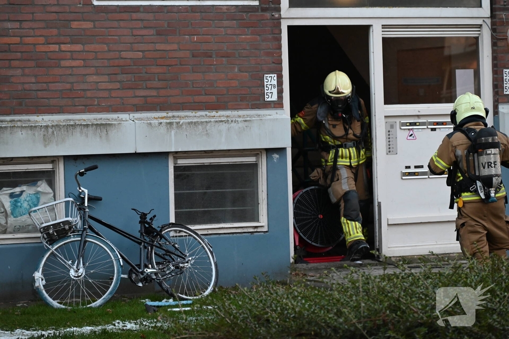 Fiets in portiek veroorzaakt brand