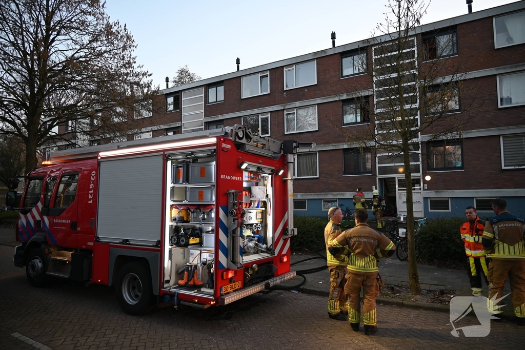 Fiets in portiek veroorzaakt brand