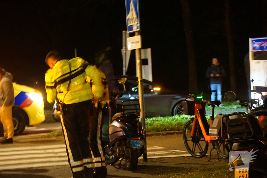 Scooterrijder in botsing met auto