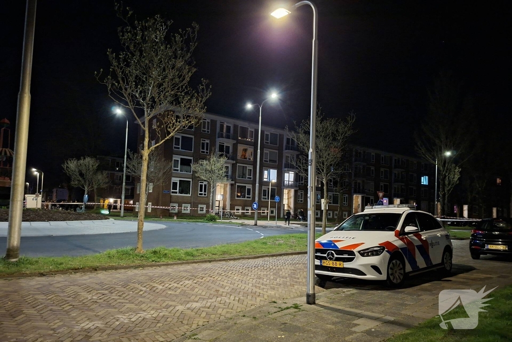 Kogelgaten in ramen van woning