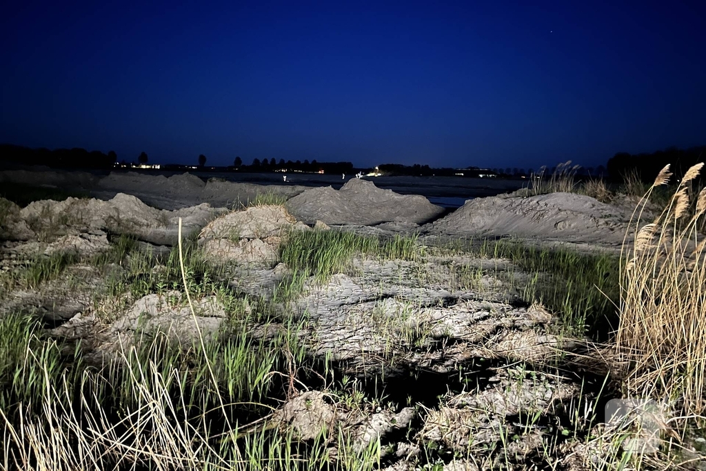 Buitenbrand geblust aan strand
