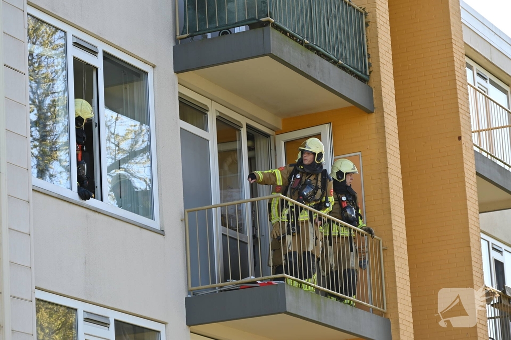 Brand op balkon van portiekwoning