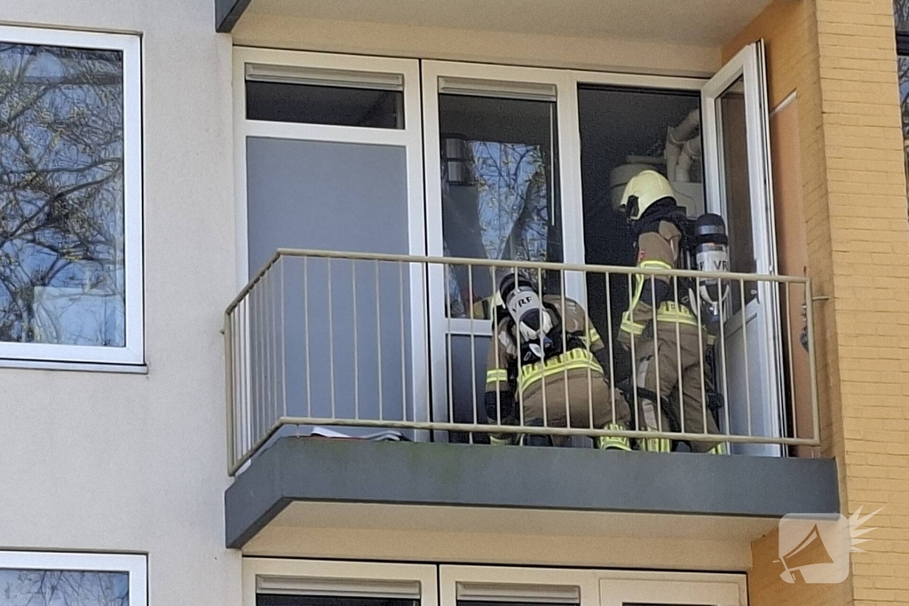 Brand op balkon van portiekwoning