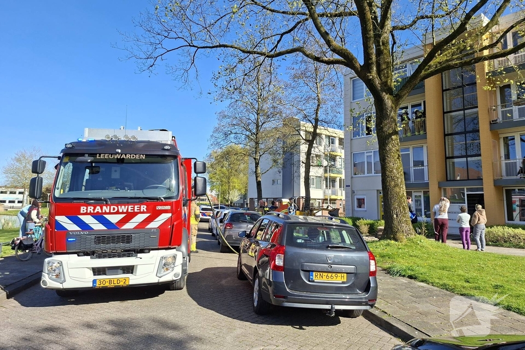 Brand op balkon van portiekwoning