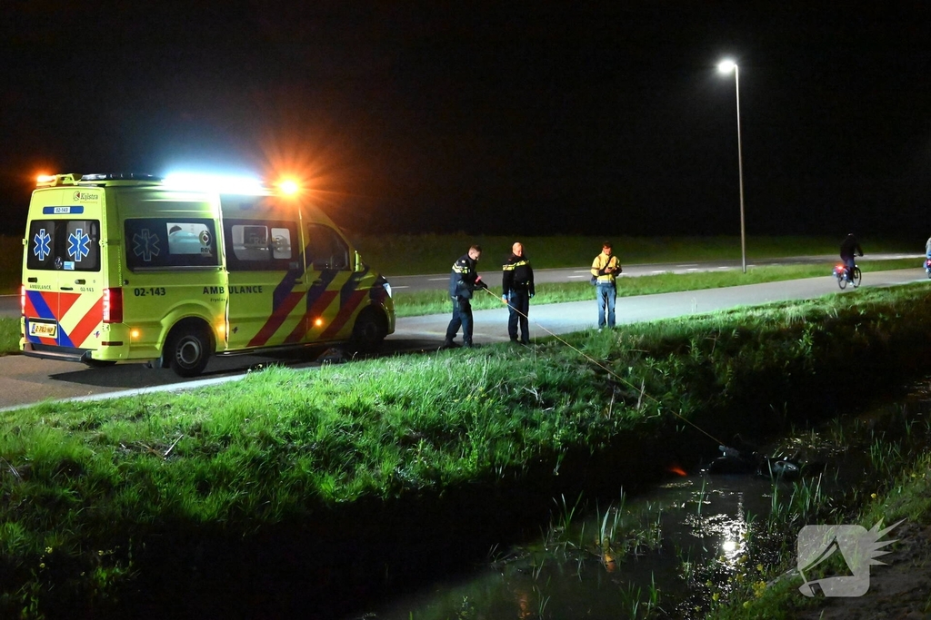 Scootmobiel te water