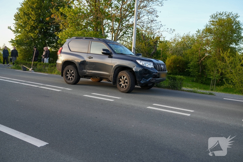 Automobilist in botsing met stadsbus