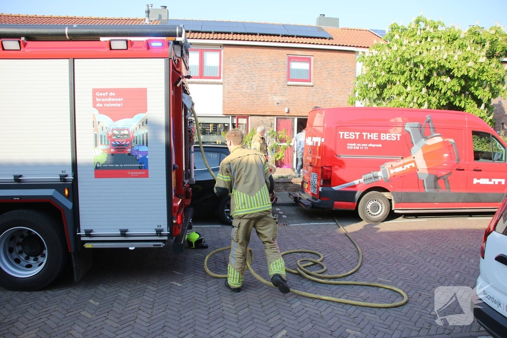 Bewoner ademt rook in bij brand