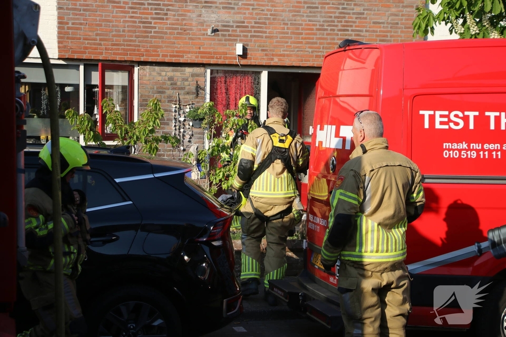Bewoner ademt rook in bij brand