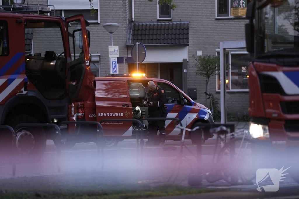 Brand in flatwoning veroorzaakt schade