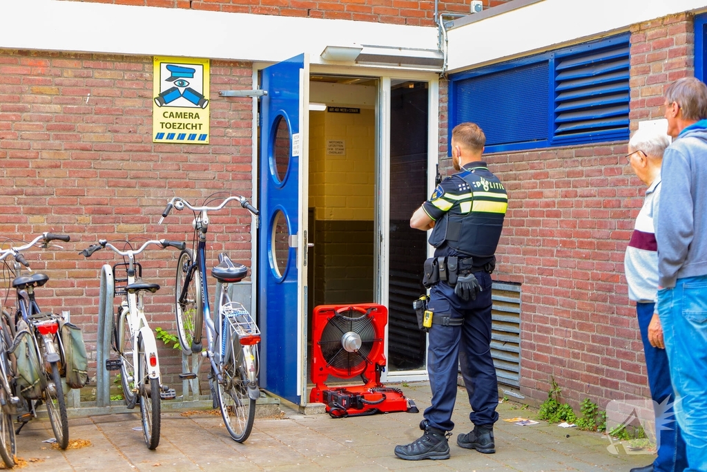 Brand in flatwoning onder controle