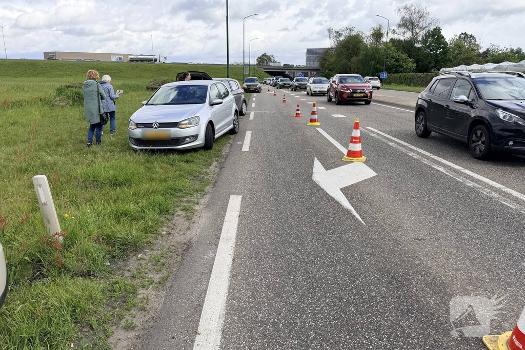 Kopstaart aanrijding met drie voertuigen