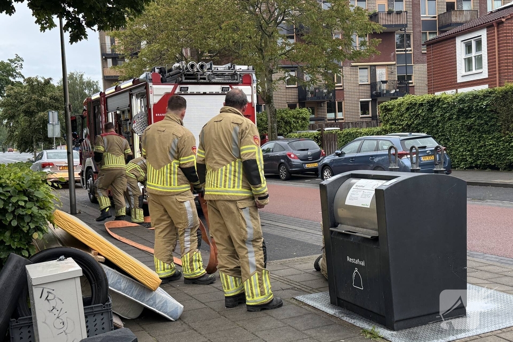 Ondergrondse container in brand