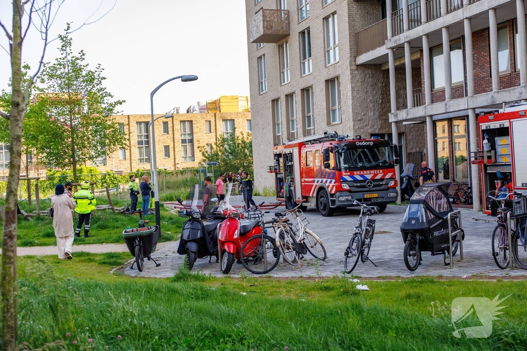 Brand in flat met evacuaties