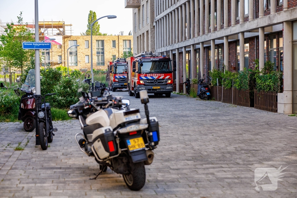 Brand in flat met evacuaties