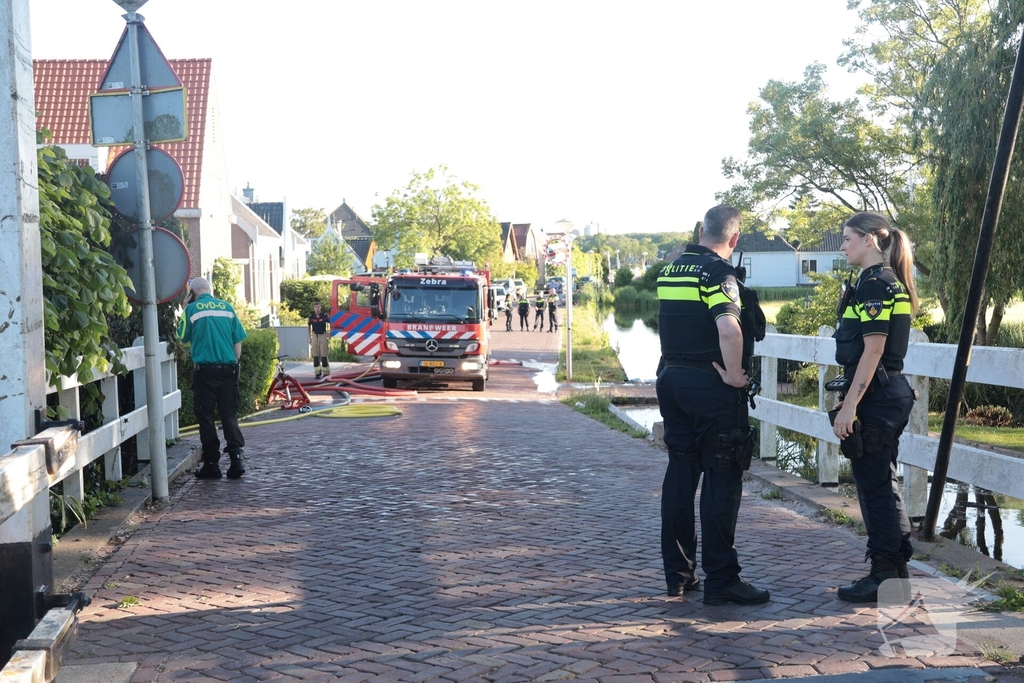 Bewoner nagekeken na brand in woning