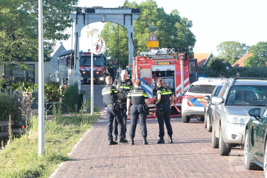 Bewoner nagekeken na brand in woning