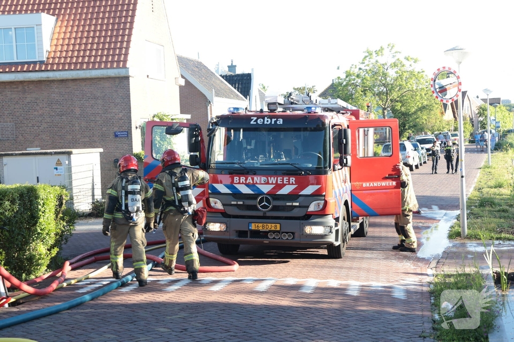 Bewoner nagekeken na brand in woning