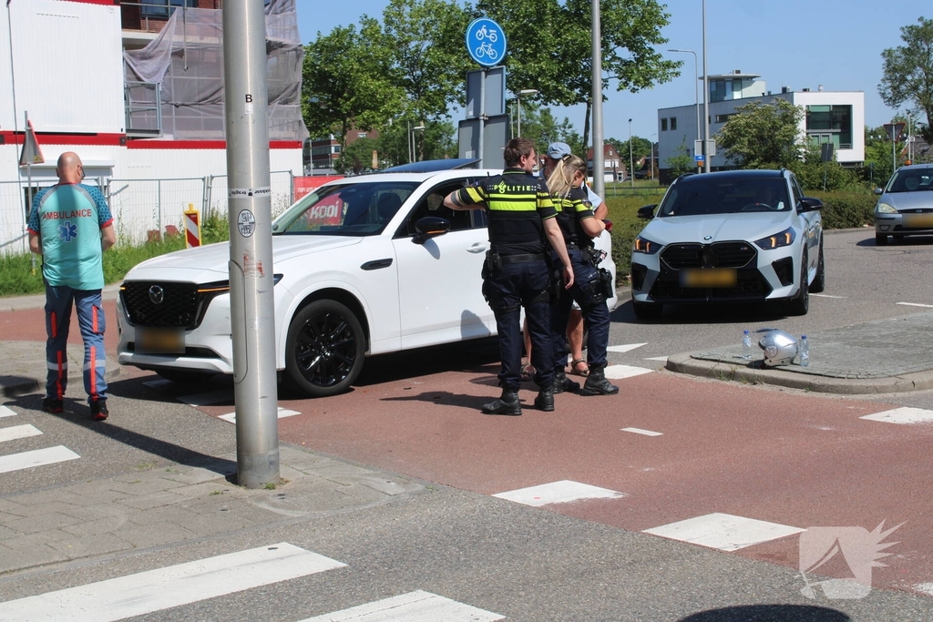 Scooterrijder gewond bij aanrijding op rotonde