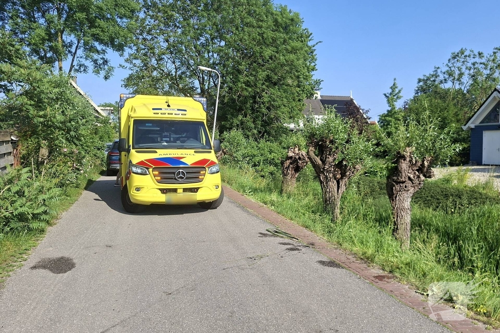 Scootmobielrijder in water terechtgekomen
