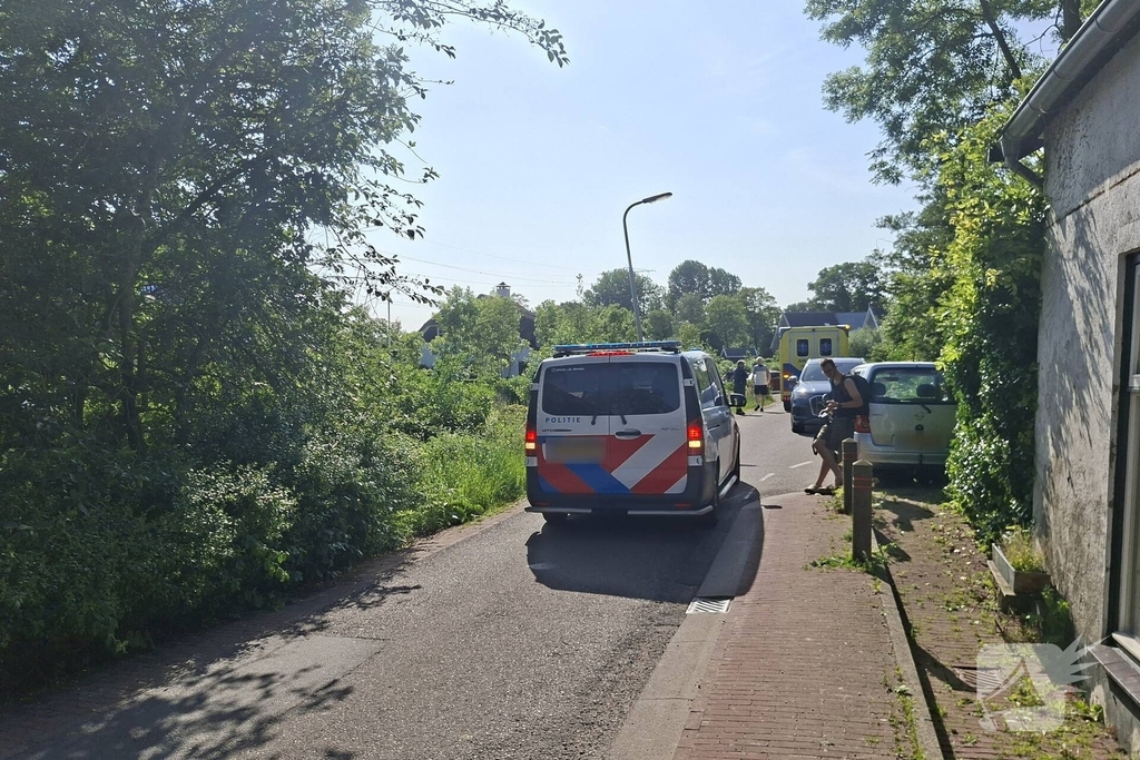 Scootmobielrijder in water terechtgekomen