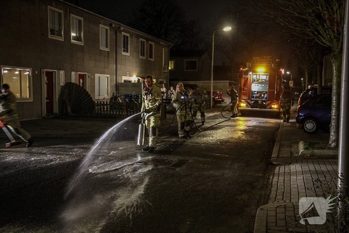 Weg bezaaid met liters olie