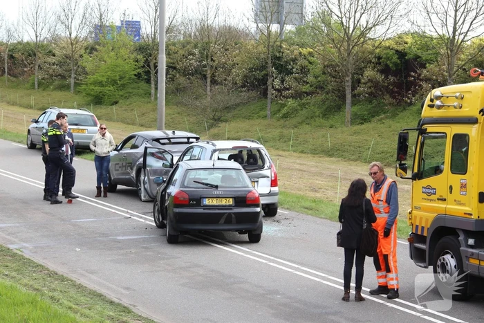 Forse schade bij kop-staartbotsing met 5 auto's