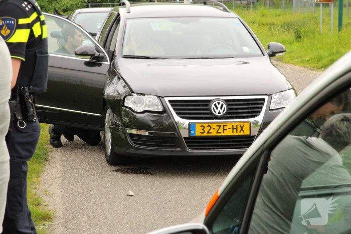 Schade bij botsing op rotonde