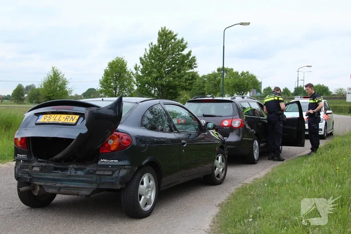 Schade bij botsing op rotonde