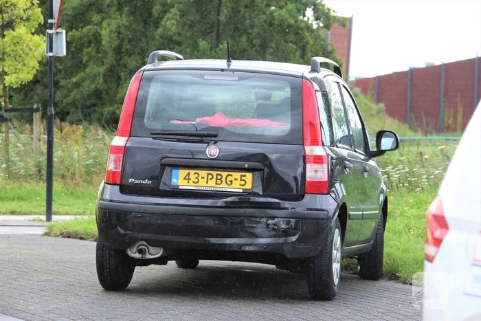 Kop-staartbotsing op rotonde