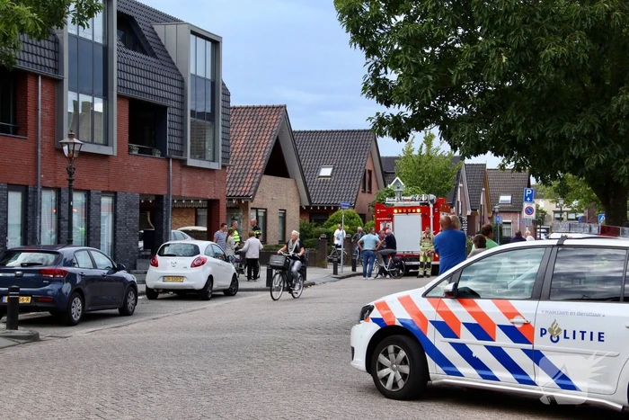 Bewoner gered door pan op het vuur