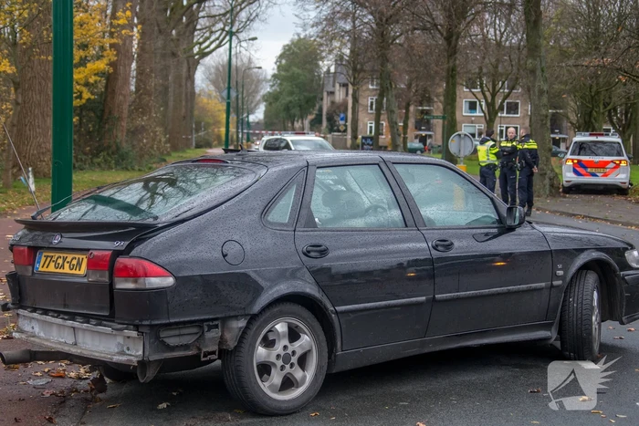 Politieauto in botsing met personenauto