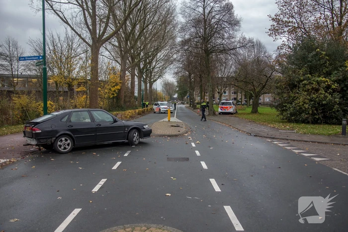 Politieauto in botsing met personenauto