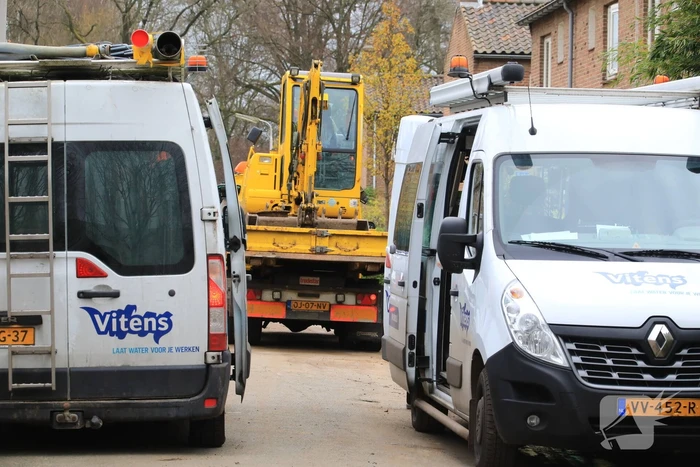 Straat afgezet door waterlekkage