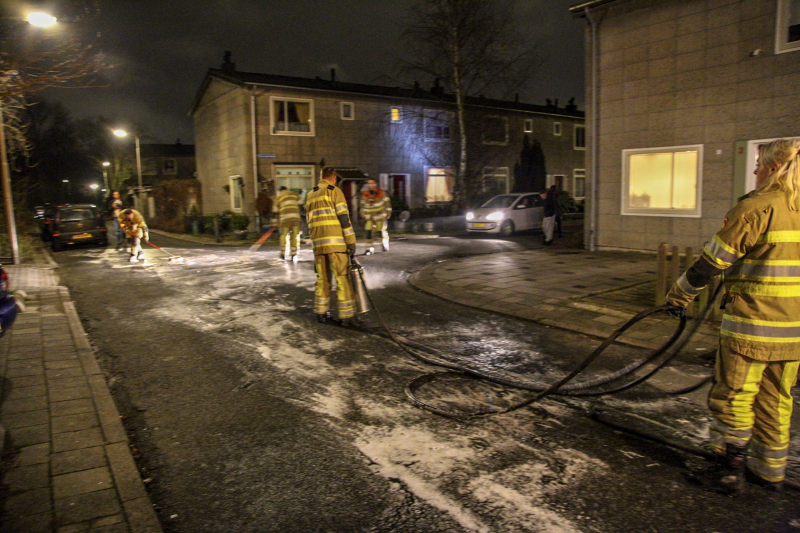 Weg bezaaid met liters olie