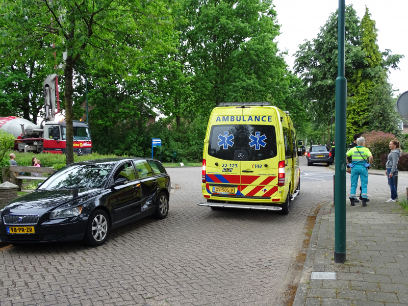 Schade na botsing op kruising