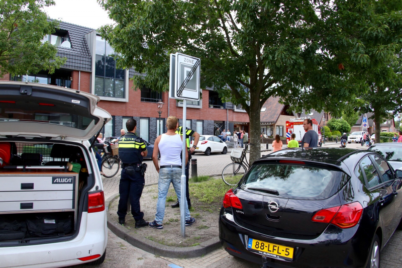 Bewoner gered door pan op het vuur