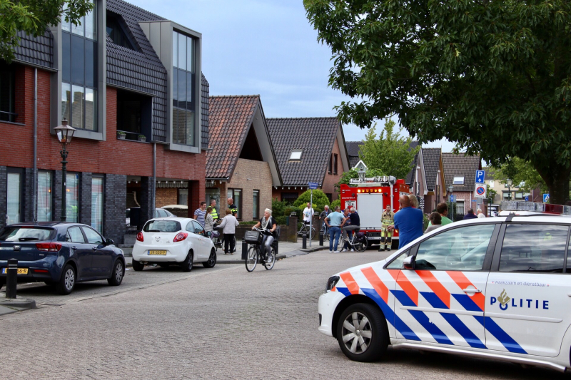 Bewoner gered door pan op het vuur