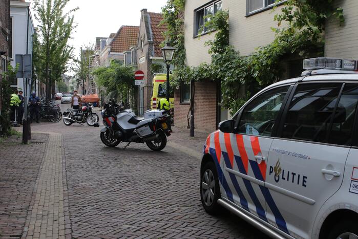 Scooterrijder gewond na botsing met motorrijder