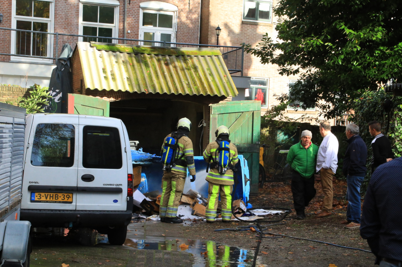 Papiercontainer vat vlam