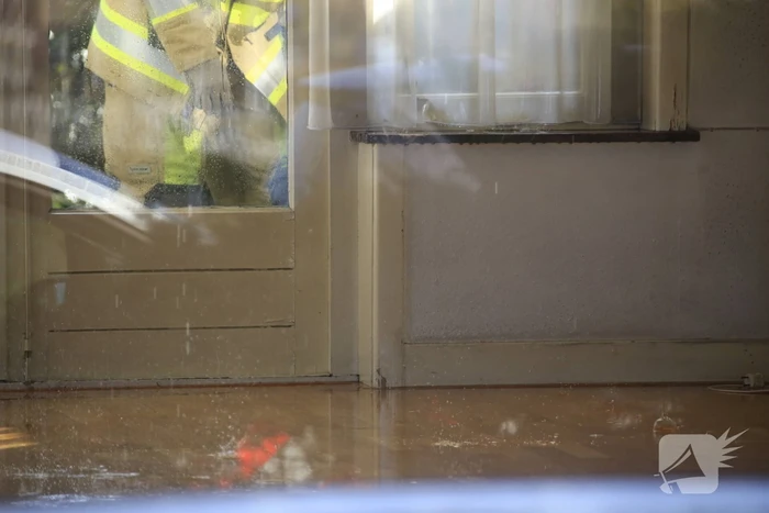 Woonkamer leegstaande woning blank