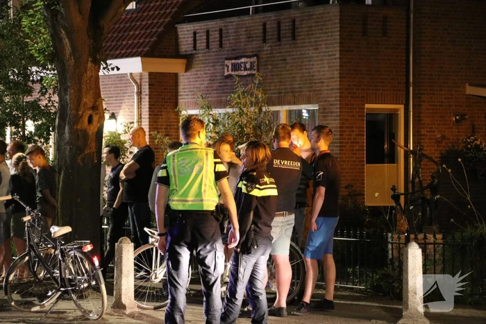 Uitslaande woningbrand boven winkel