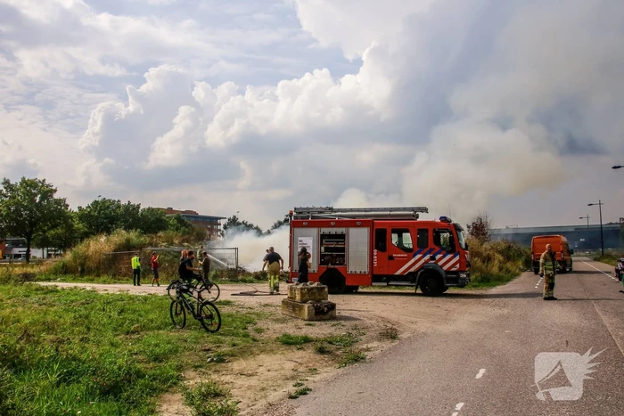 Veel rook langs A1 door afvalbrand