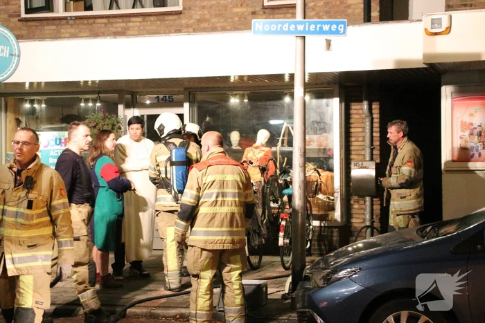 Grote schade en ravage bij winkelbrand