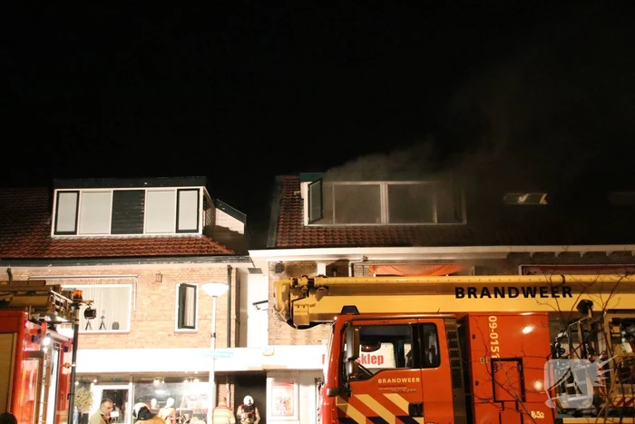 Grote schade en ravage bij winkelbrand