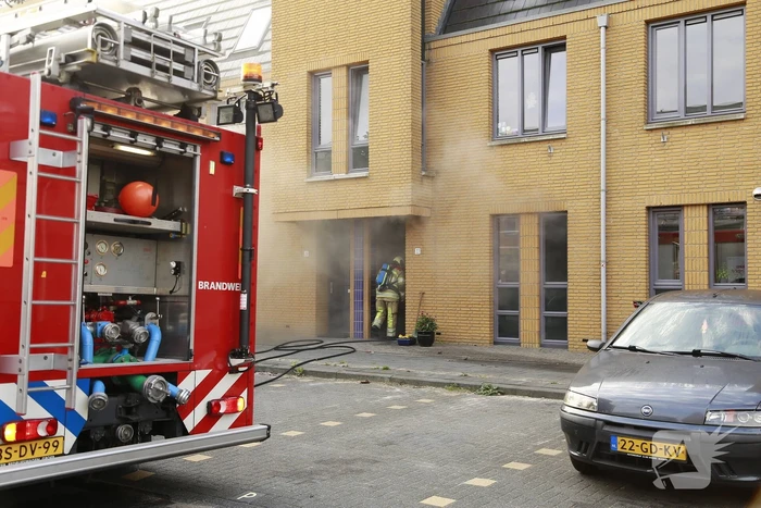 Veel rook bij brand in keuken