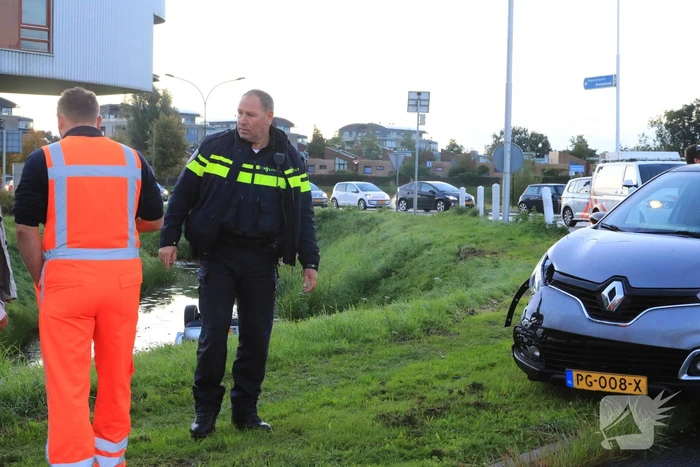 Auto te water na aanrijding